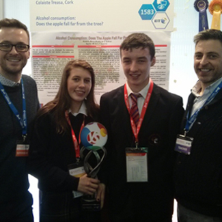 Pictured L-R: PhD candidate Martin Davoren with BT Young Scientist winners Eimear Murphy and Ian O'Sullivan from Coláiste Treasa in Kanturk, Co. Cork and their Science teacher Mr Derry O'Donovan (image via Martin Davoren) 